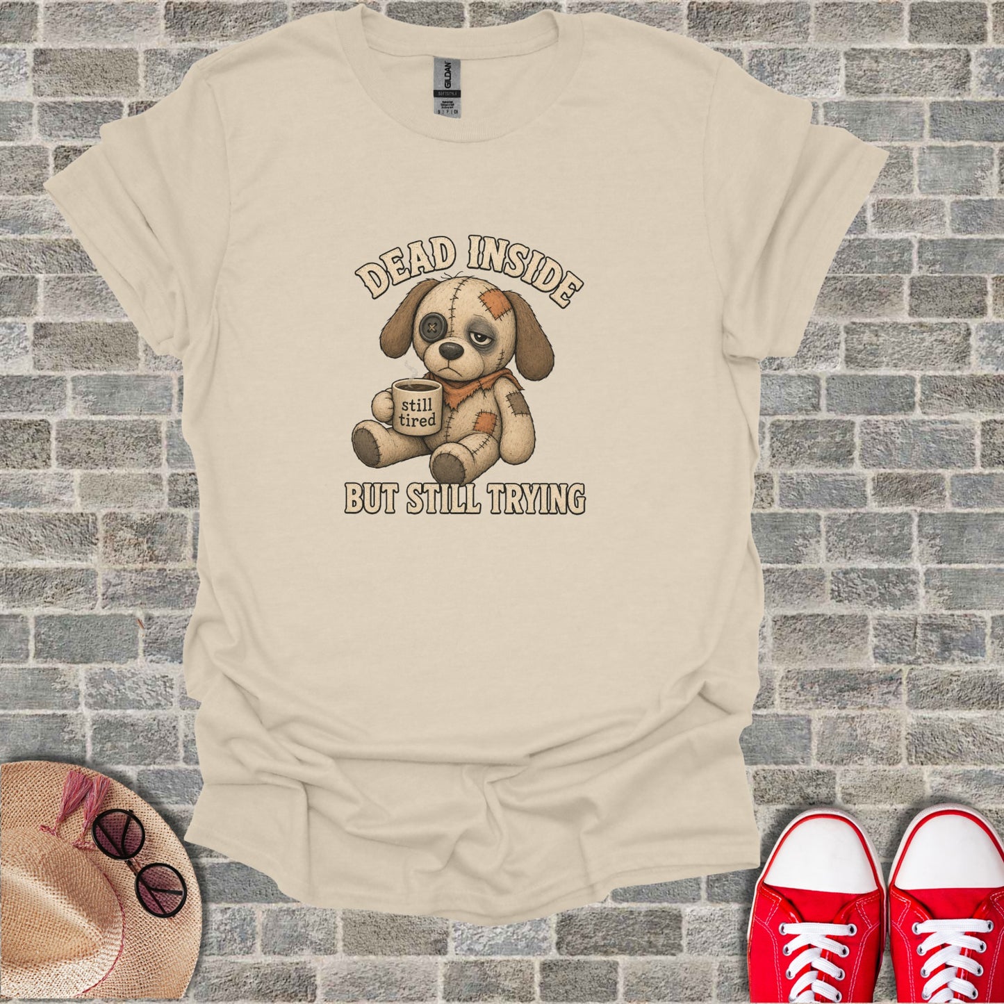 T-shirt with cartoon dog holding mug, "DEAD INSIDE BUT STILL TRYING" text.
