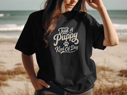 Black t-shirt with "Just A Puppy Kind Of Day" text and a paw print.