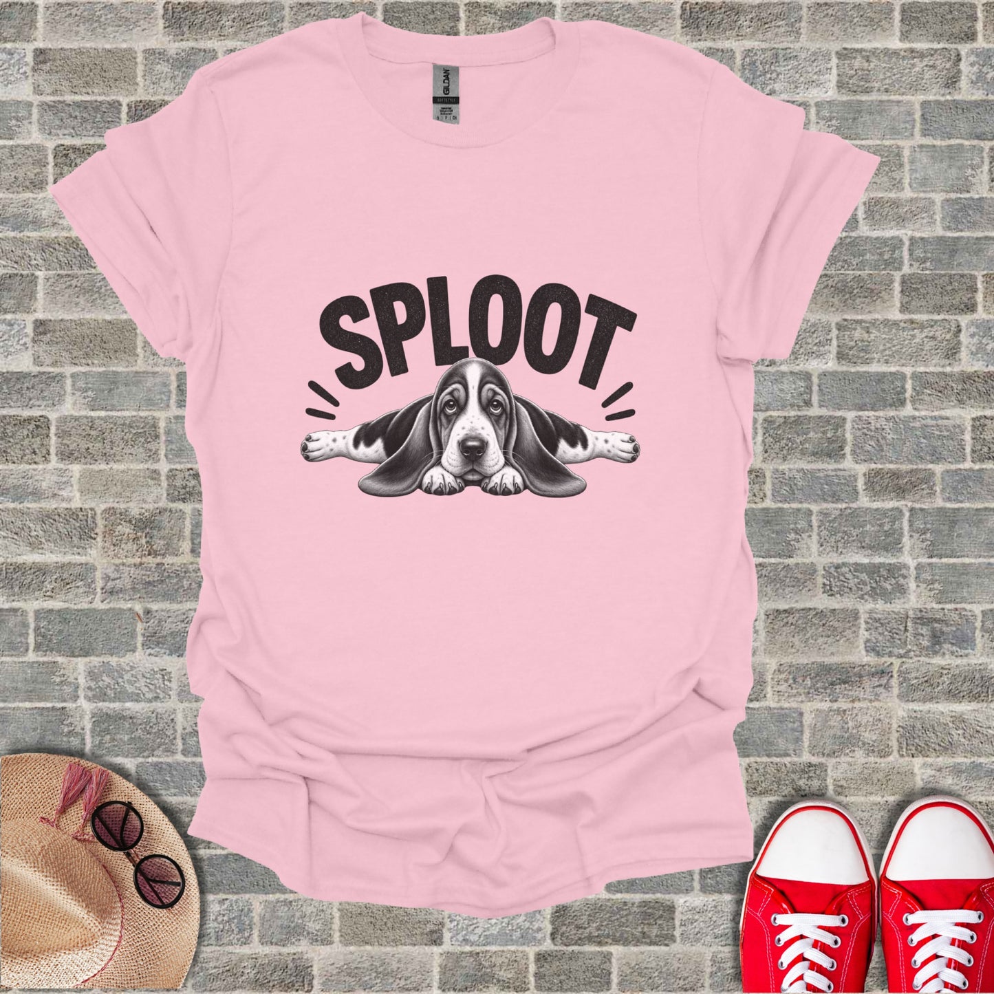 Pink t-shirt with a basset hound dog graphic and the word "SPLOOOT".