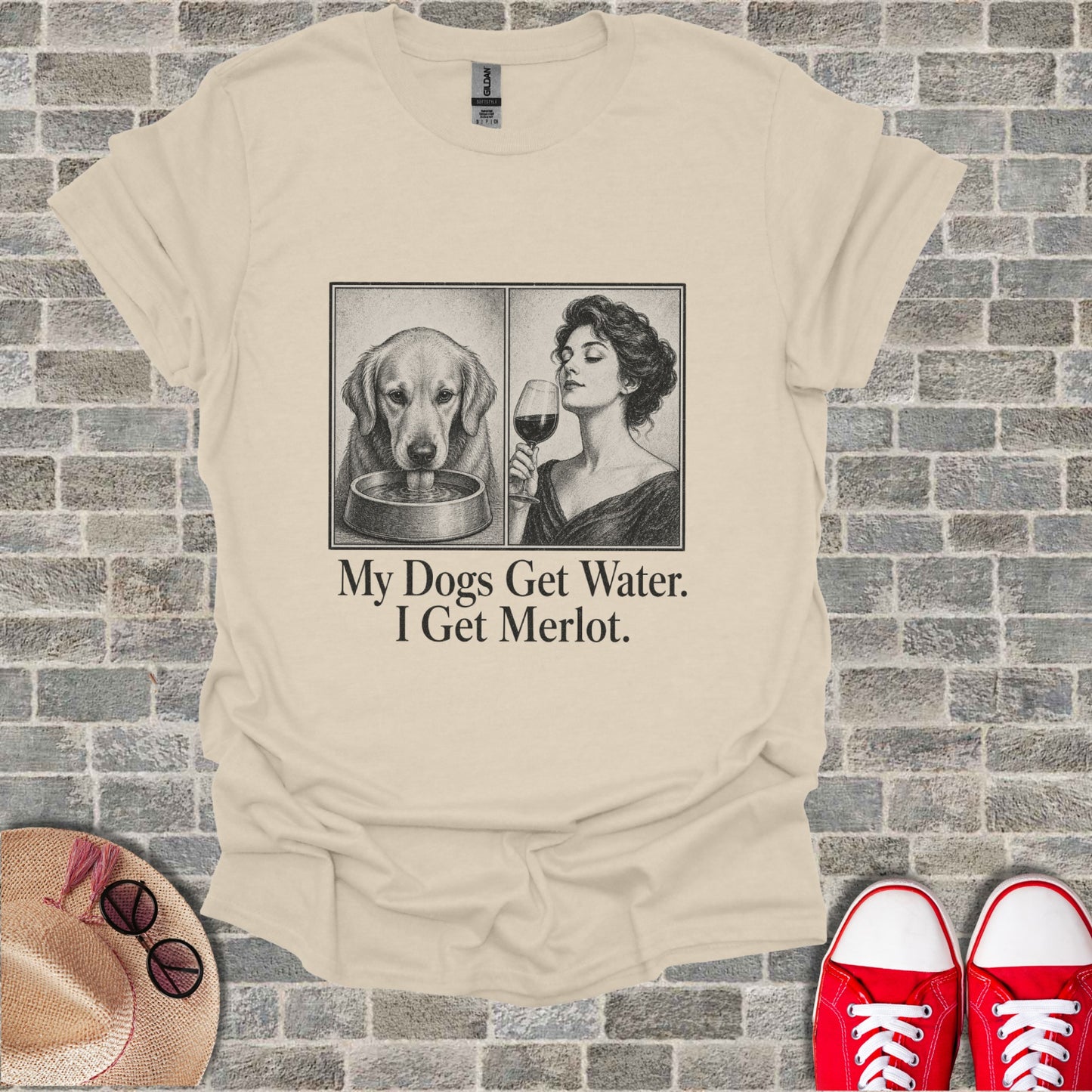 T-shirt with image of dog drinking and woman smelling wine with text "My Dogs Get Water. I Get Merlot."