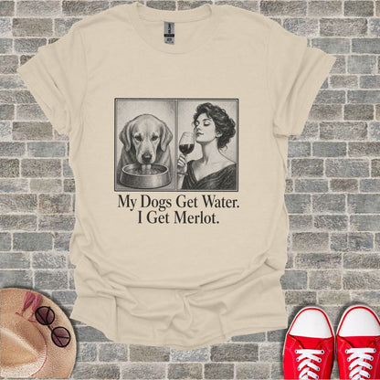 T-shirt with image of dog drinking and woman smelling wine with text "My Dogs Get Water. I Get Merlot."