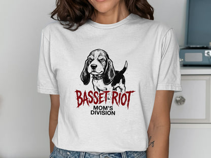 White t-shirt with a black and white basset hound illustration and "BASSET RIOT MOM'S DIVISION" text.