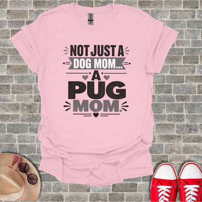 Pink t-shirt with "Not Just A Dog Mom... A Pug Mom" graphic.