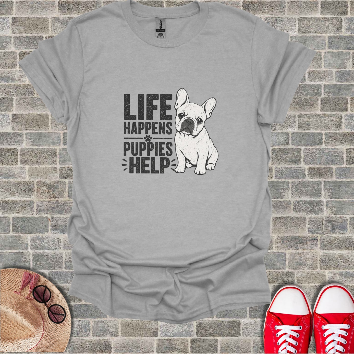 Gray t-shirt with "LIFE HAPPENS PUPPIES HELP" and French bulldog graphic.