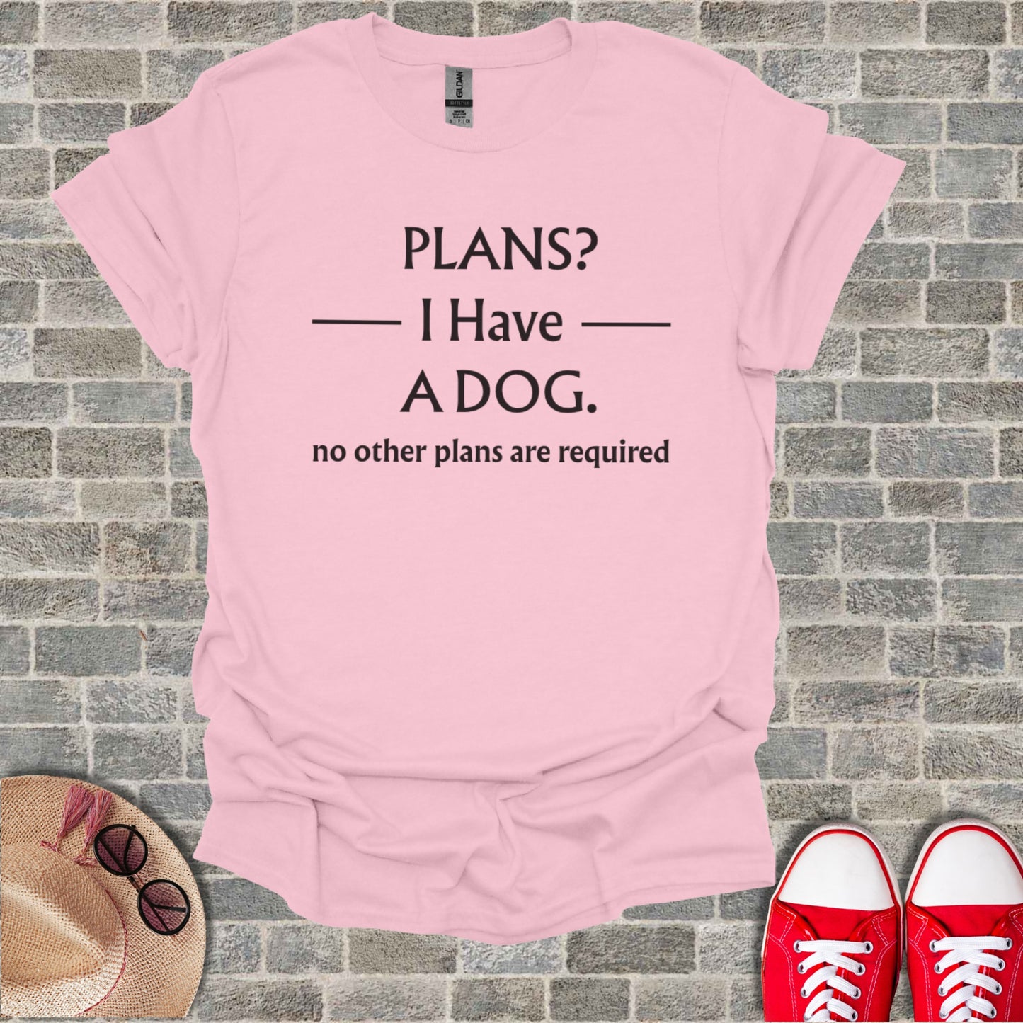 Pink t-shirt with black text "PLANS? I Have A DOG. no other plans are required".