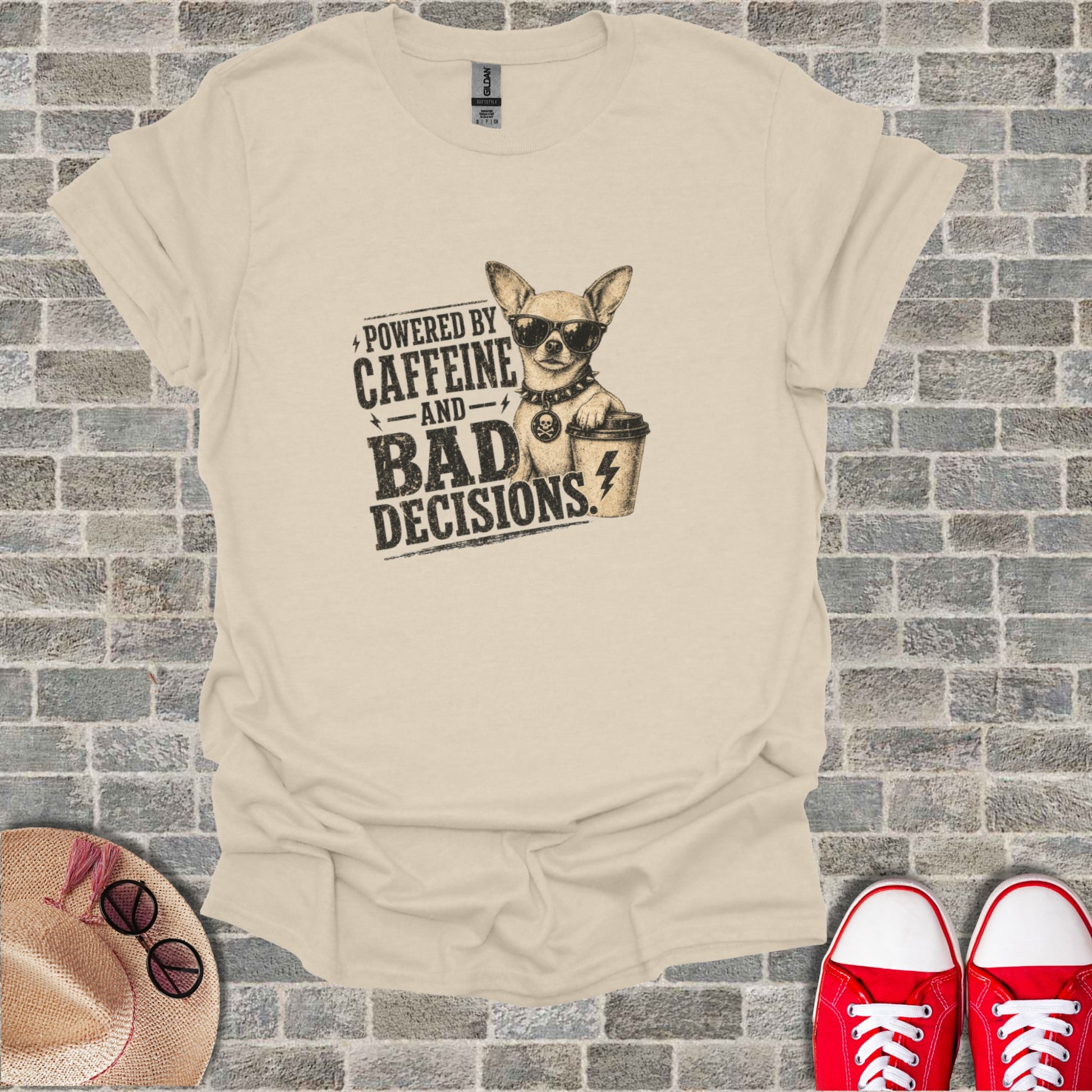 T-shirt with graphic of chihuahua wearing sunglasses and holding coffee cup, text "Powered by Caffeine and Bad Decisions".
