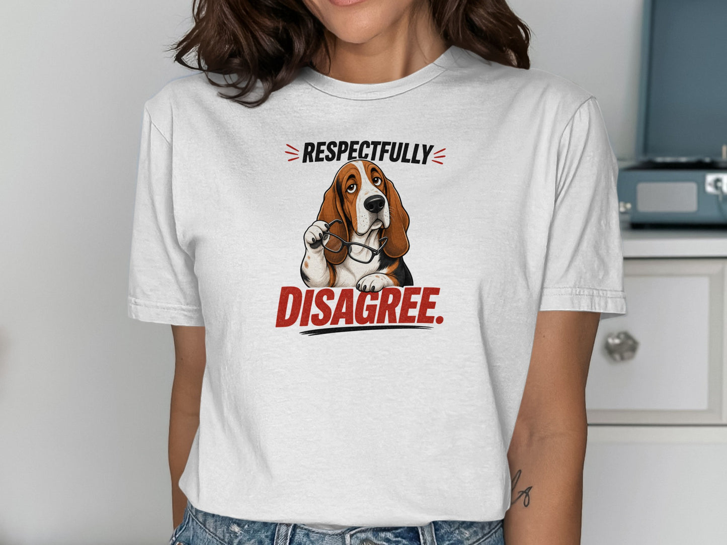 White t-shirt with a Basset Hound wearing glasses and text that reads "RESPECTFULLY DISAGREE."