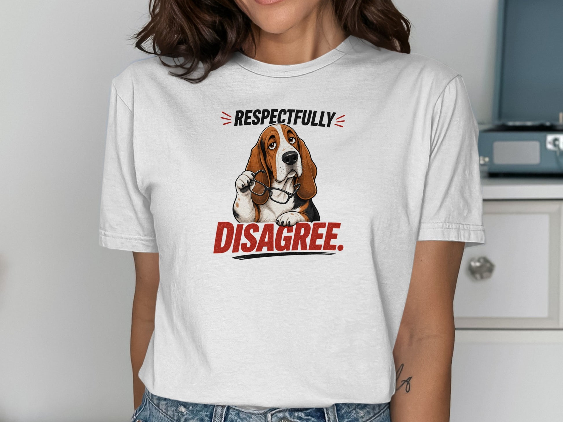 White t-shirt with a Basset Hound wearing glasses and text that reads "RESPECTFULLY DISAGREE."