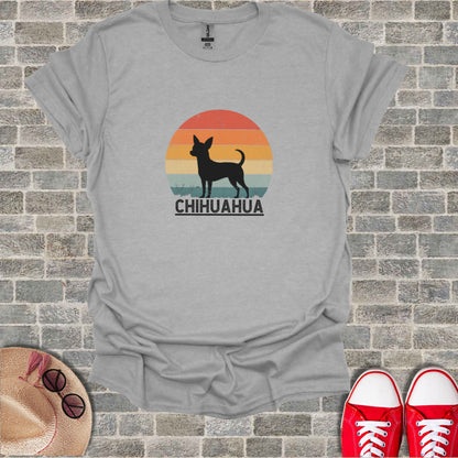 Chihuahua silhouette against a retro sunset with text.