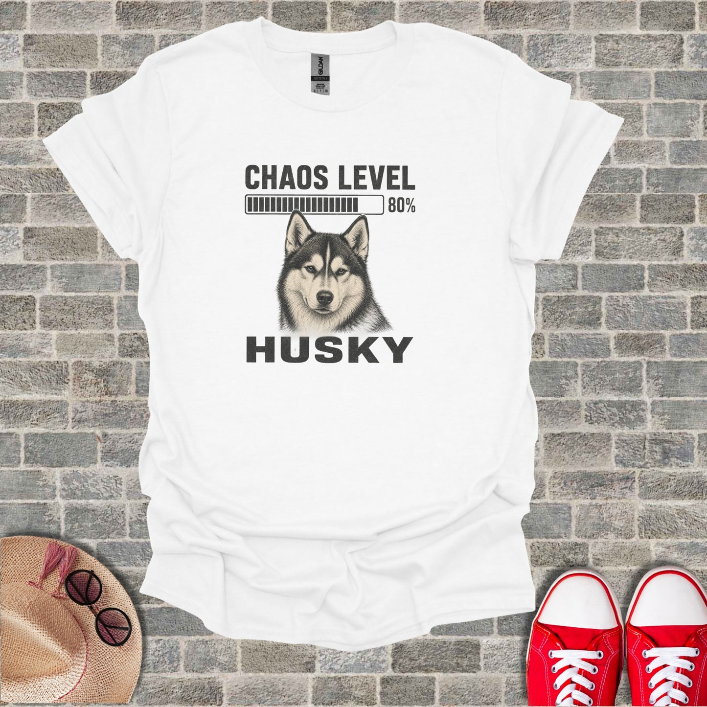 White t-shirt with "Chaos Level 80% Husky" text and husky dog illustration.