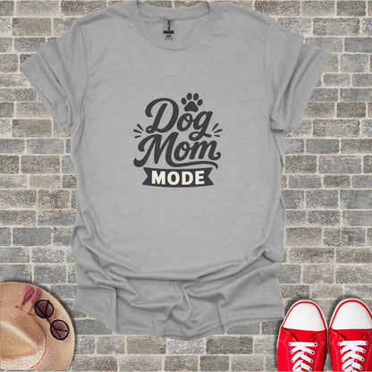 Grey t-shirt with "Dog Mom Mode" text and paw print graphic.