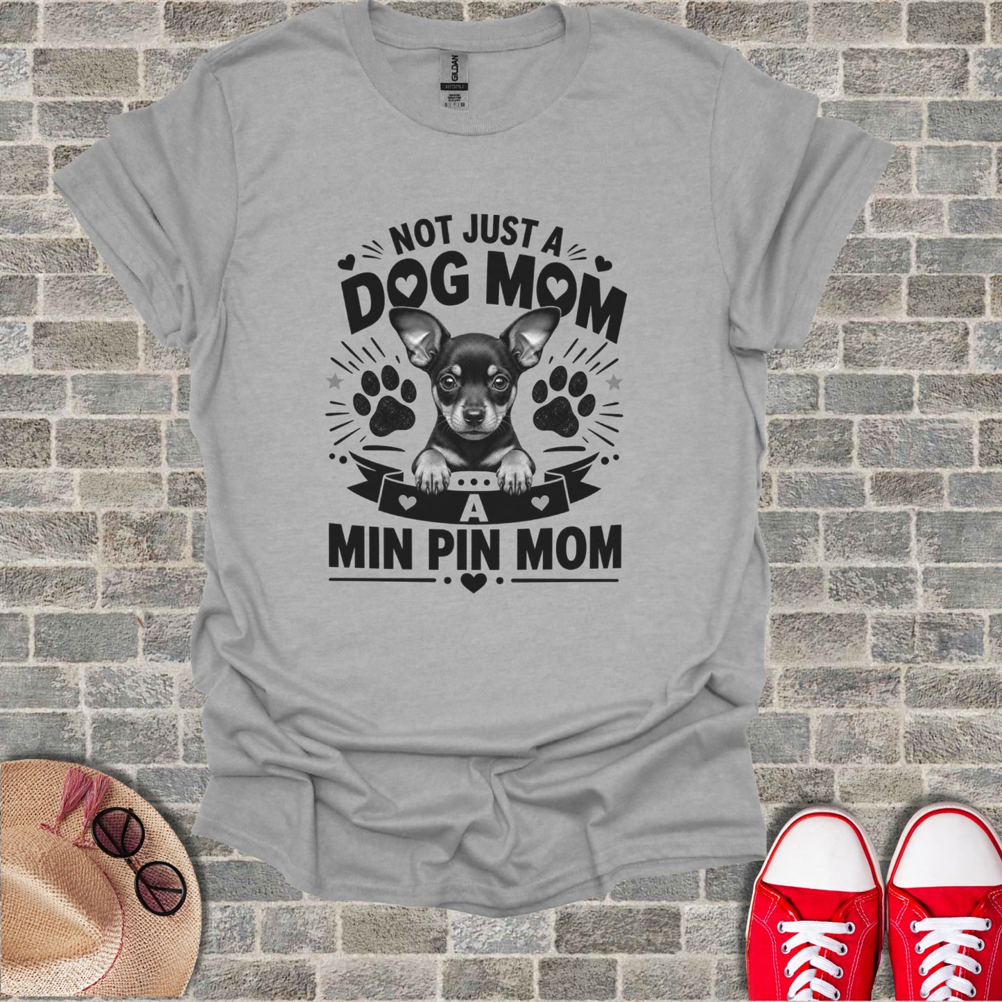 Grey t-shirt with the text "NOT JUST A DOG MOM A MIN PIN MOM".