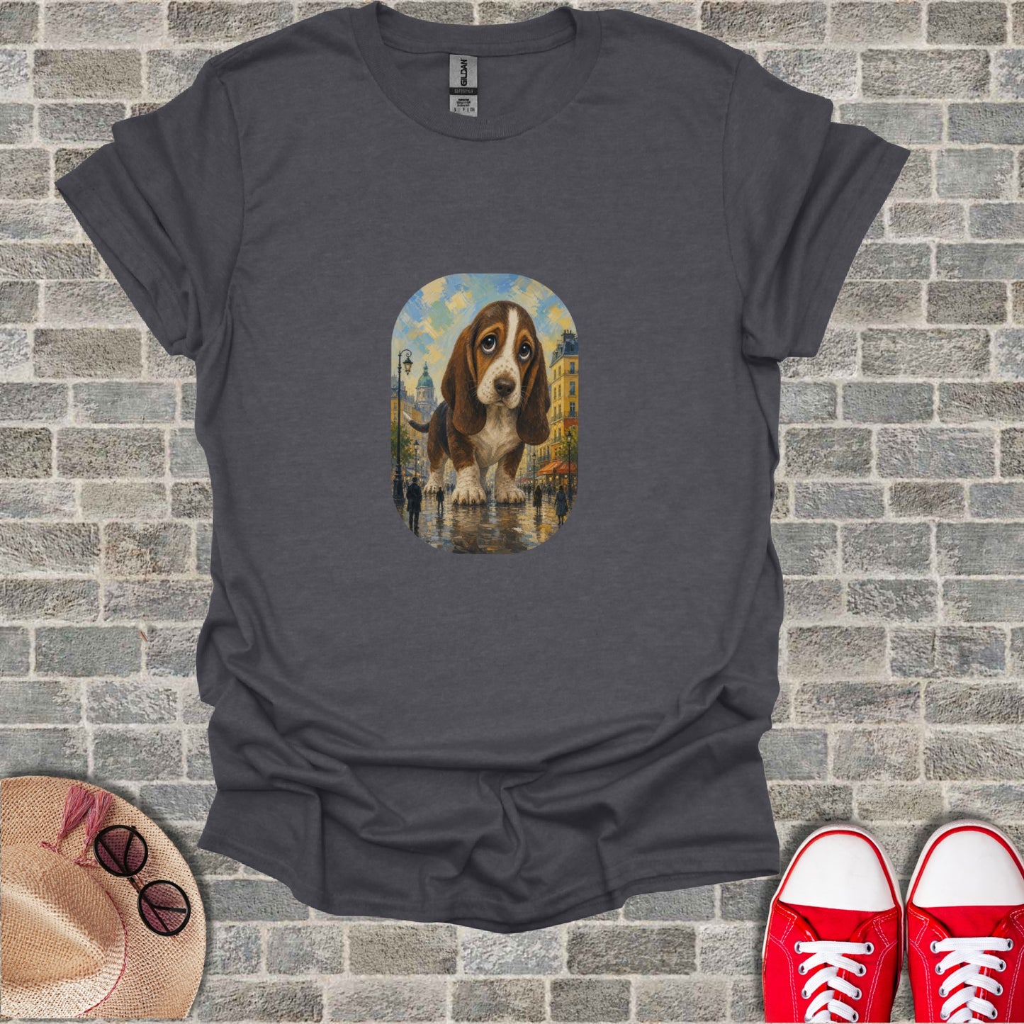 Dark grey t-shirt featuring a Basset Hound in an impressionistic city scene with red sneakers and straw hat.