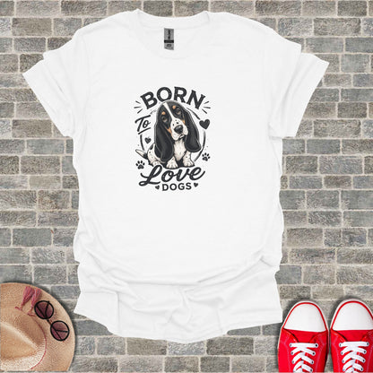 White t-shirt with "Born to Love Dogs" graphic and Basset Hound illustration.