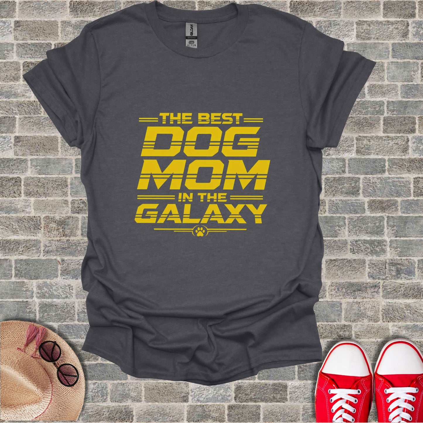 Dark gray t-shirt with yellow text "THE BEST DOG MOM IN THE GALAXY"