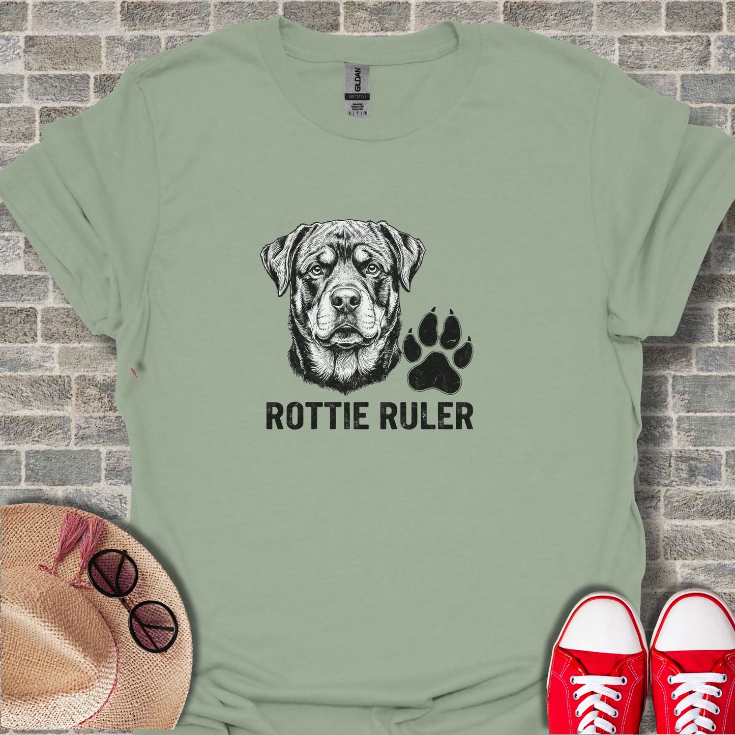 Light green t-shirt with a Rottweiler and paw print graphic and "ROTTIE RULER" text.
