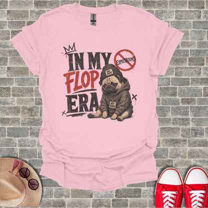 Pink t-shirt with a pug wearing a hoodie and the text "In My Flop Era."