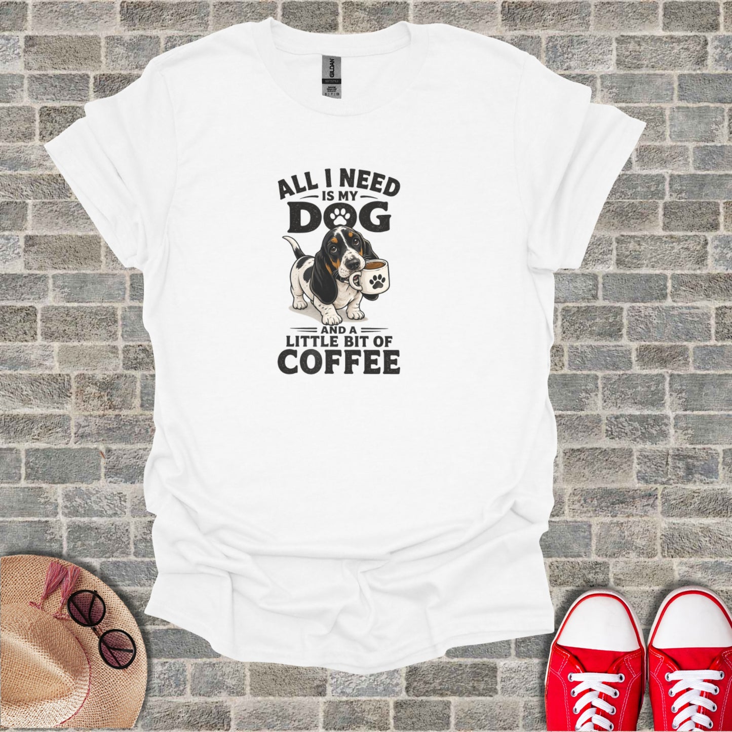 White t-shirt with text "All I Need is my Dog and a Little Bit of Coffee" and a graphic.