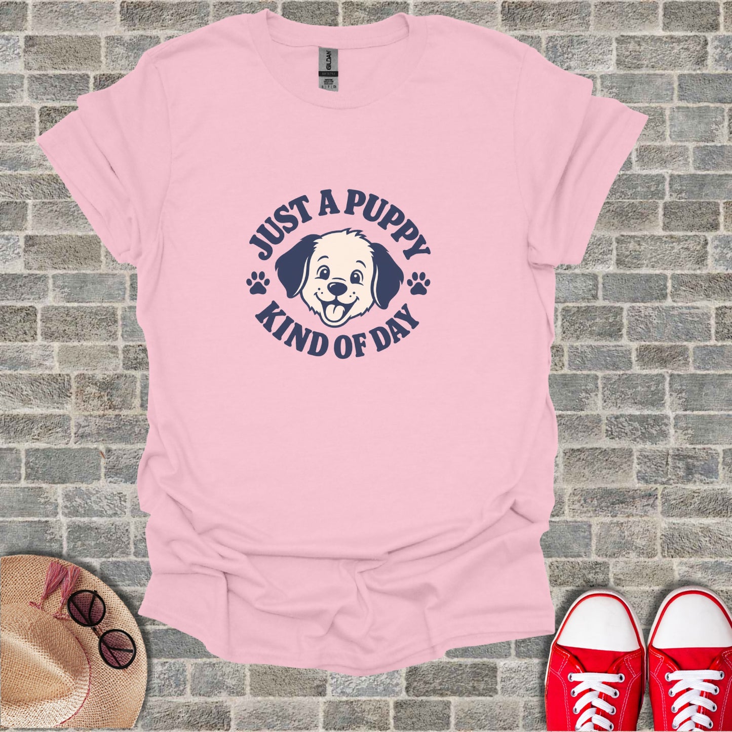 Pink t-shirt with "Just a puppy kind of day" text and a happy puppy graphic.