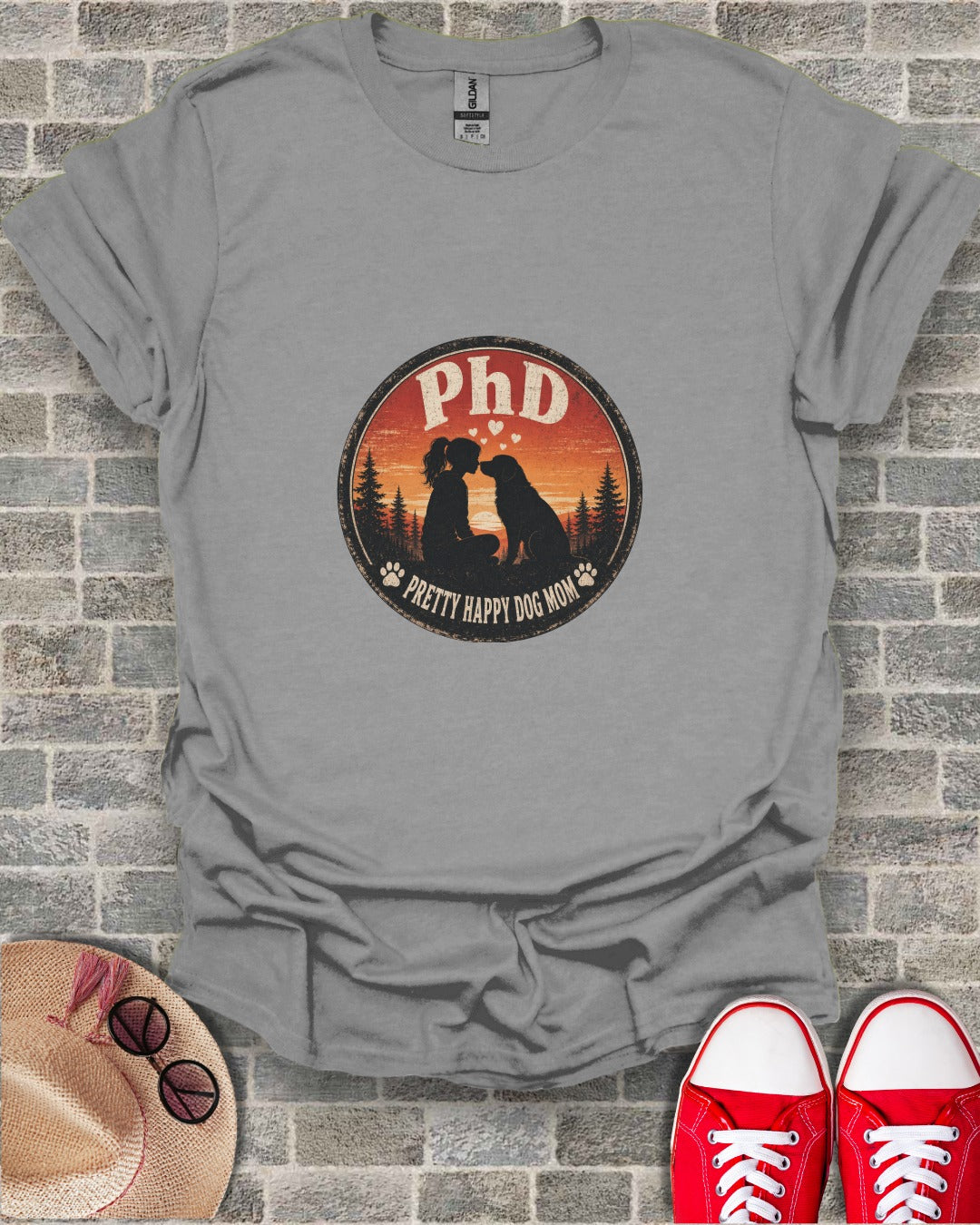 Grey t-shirt with "PhD Pretty Happy Dog Mom" text and dog and person silhouette.