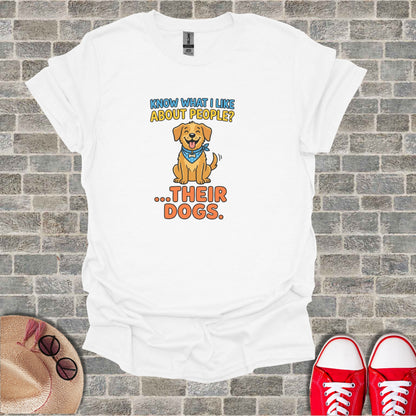 White t-shirt with cartoon dog and text "Know what I like about people?...Their Dogs."
