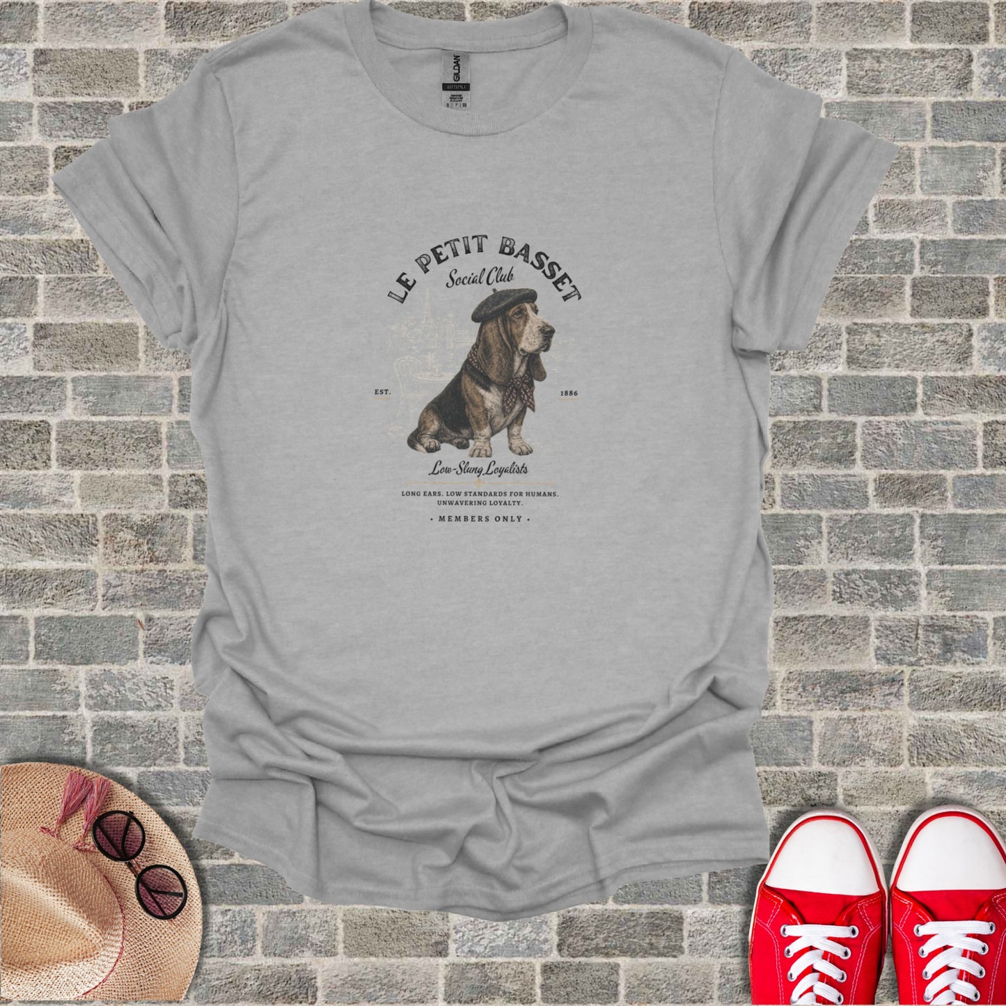 Gray t-shirt with Le Petit Basset Social Club logo featuring a basset hound.