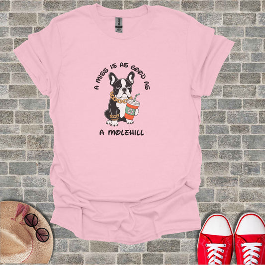Pink t-shirt with a French bulldog and coffee cup graphic and text.