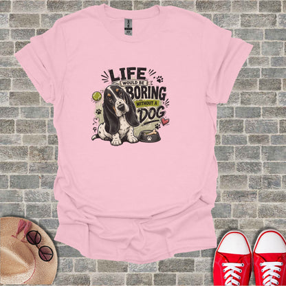 Pink t-shirt with "LIFE WOULD BE BORING WITHOUT A DOG" text and a basset hound illustration.