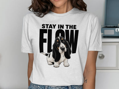 Basset Hound puppy on white t-shirt with text "STAY IN THE FLOW".