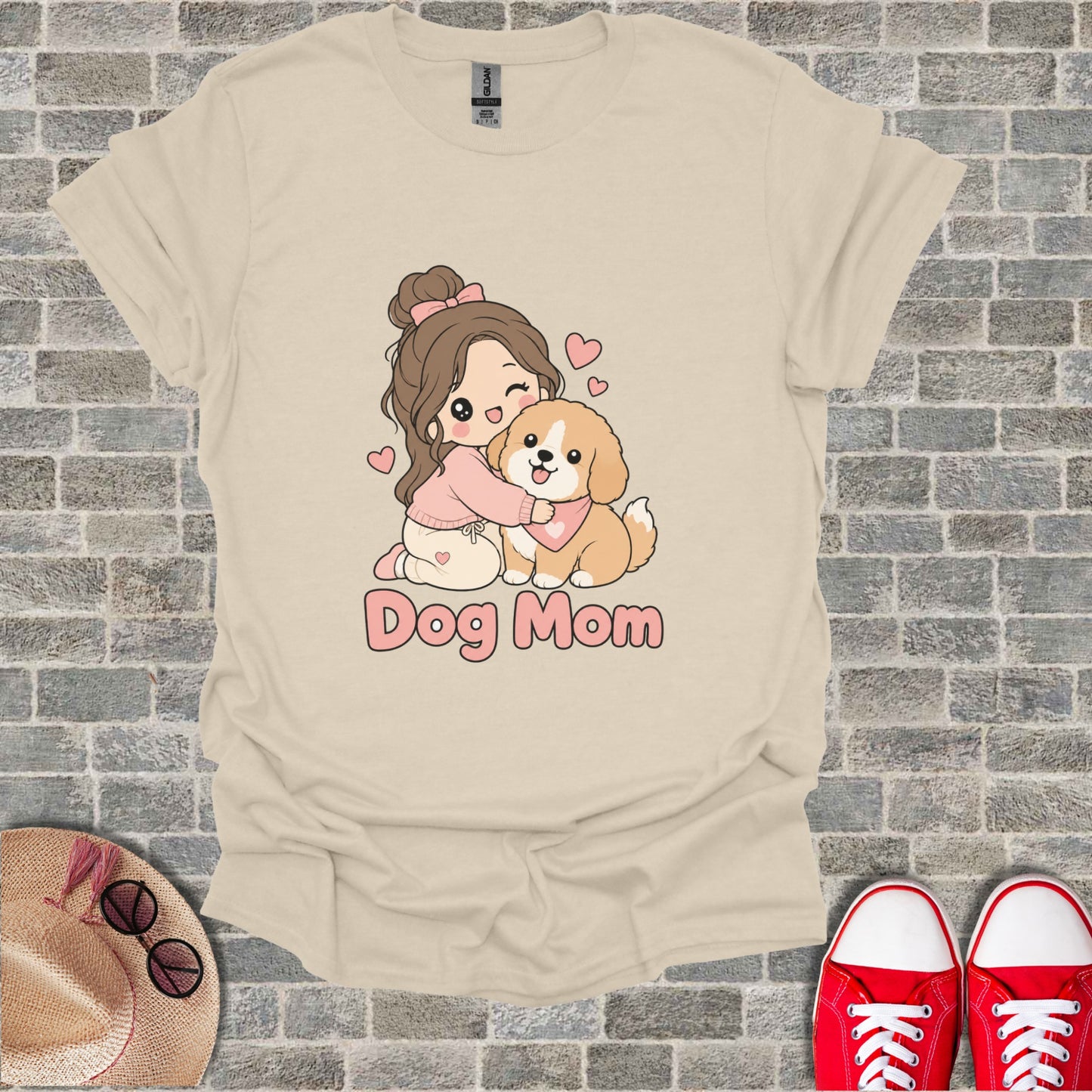 T-shirt graphic of a girl hugging a dog with text "Dog Mom".