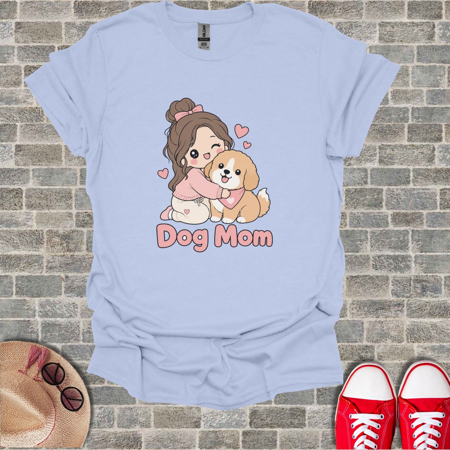 Light blue t-shirt with "Dog Mom" text and cartoon girl hugging a dog.