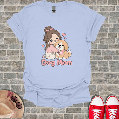 Light blue t-shirt with "Dog Mom" text and cartoon girl hugging a dog.