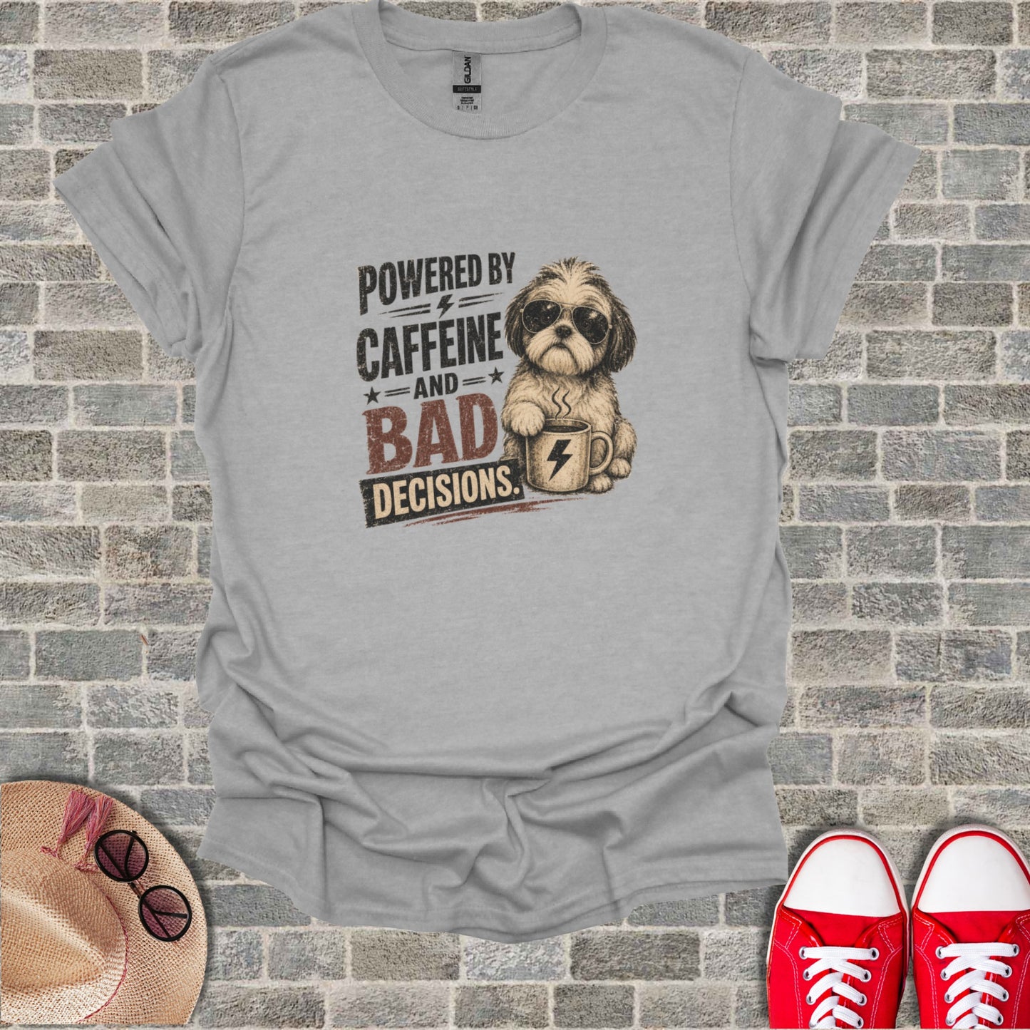 Grey t-shirt with "POWERED BY CAFFEINE AND BAD DECISIONS" text and a dog with coffee.