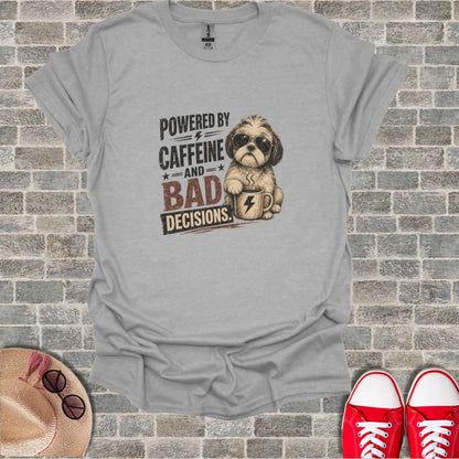 Grey t-shirt with "POWERED BY CAFFEINE AND BAD DECISIONS" text and a dog with coffee.