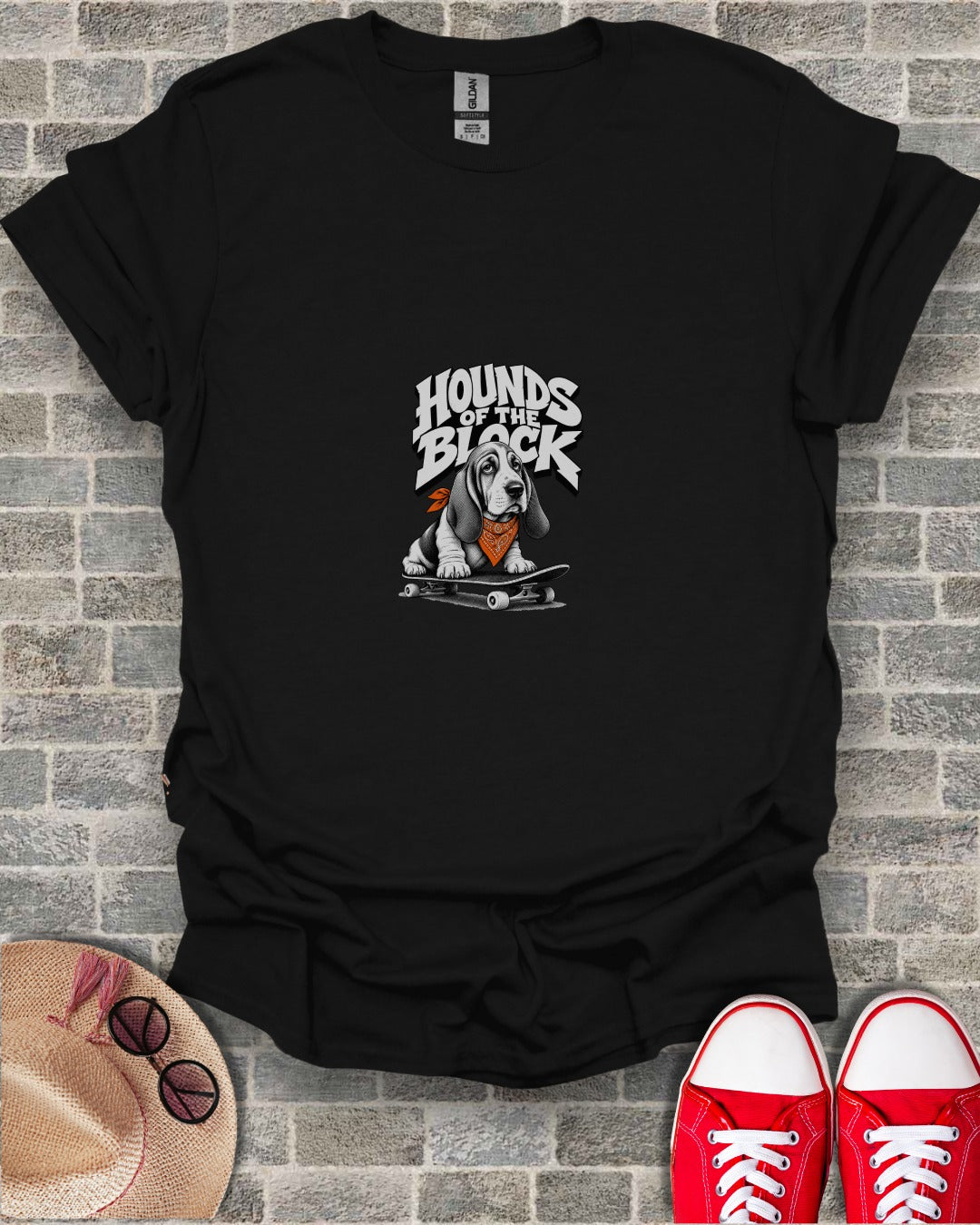Black t-shirt with "Hounds of the Black" text and a Basset Hound on a skateboard.