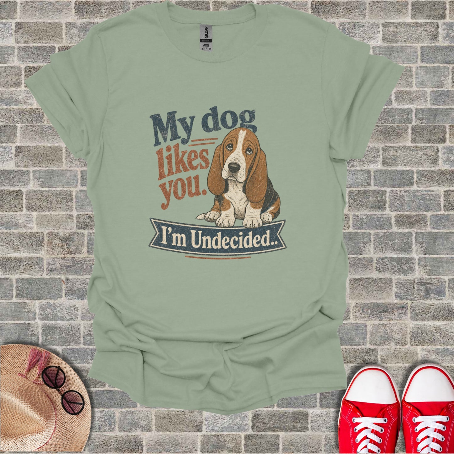 T-shirt with a Basset Hound graphic and text "My dog likes you. I'm Undecided."