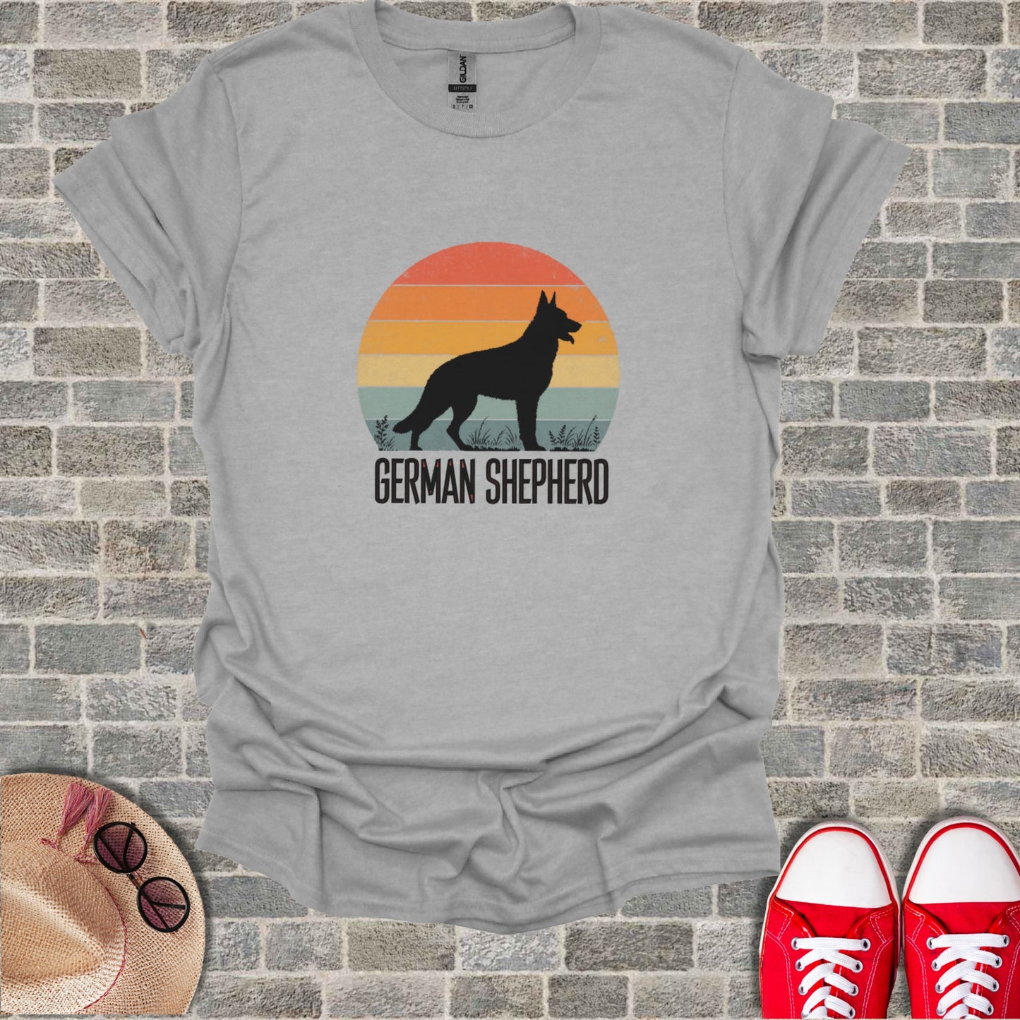 Grey t-shirt with a vintage German Shepherd silhouette and sun graphic.