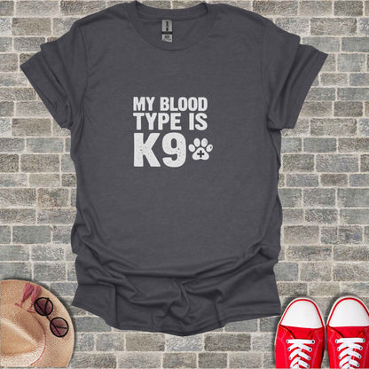 Dark gray t-shirt with "MY BLOOD TYPE IS K9" and a paw print.