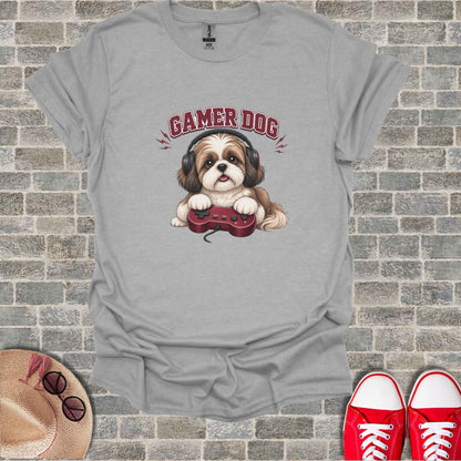 Grey t-shirt with a cartoon dog wearing headphones and holding a video game controller.