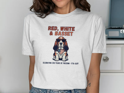 Basset hound wearing sunglasses and a flag bandana, text reads "Red, White & Basset".