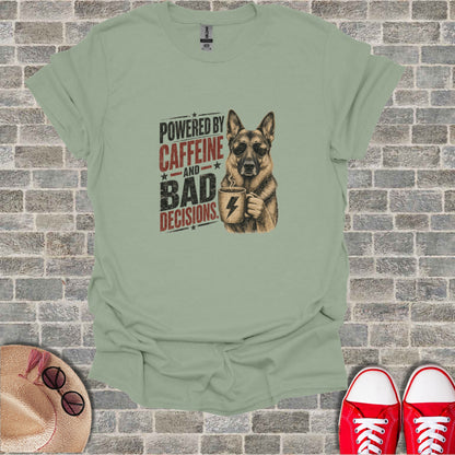 German Shepherd wearing sunglasses holding a coffee cup, text "Powered by Caffeine and Bad Decisions".