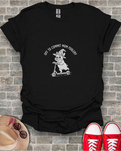 French bulldog riding scooter with text "off to commit mom foolery".