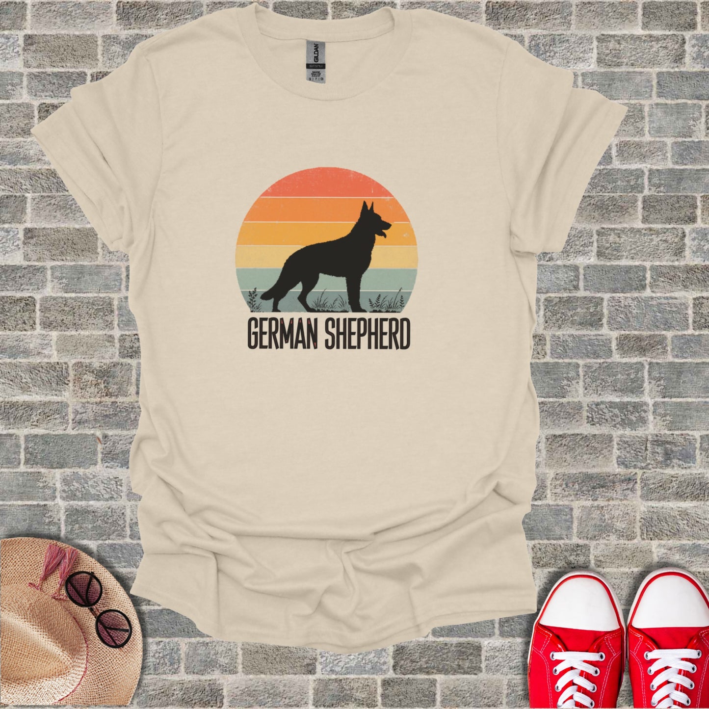T-shirt with a black German Shepherd silhouette against a sunset.