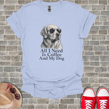 Light blue t-shirt with sketch of dog in sunglasses and text "All I Need Is Coffee And My Dog".
