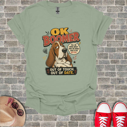 T-shirt with text "OK BOOMER OUT OF TOUCH. OUT OF DATE." and a cartoon dog.