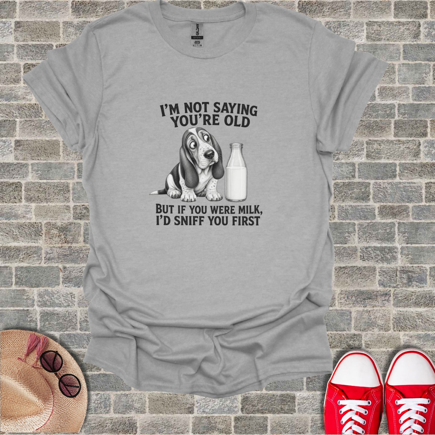 Grey t-shirt with a Basset Hound and text about milk.