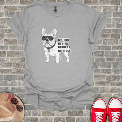 French Bulldog wearing sunglasses with text "A STITCH IN TIME GATHERS NO MOSS".