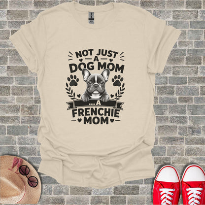 T-shirt with "Not Just A Dog Mom... A Frenchie Mom" graphic featuring a French Bulldog.
