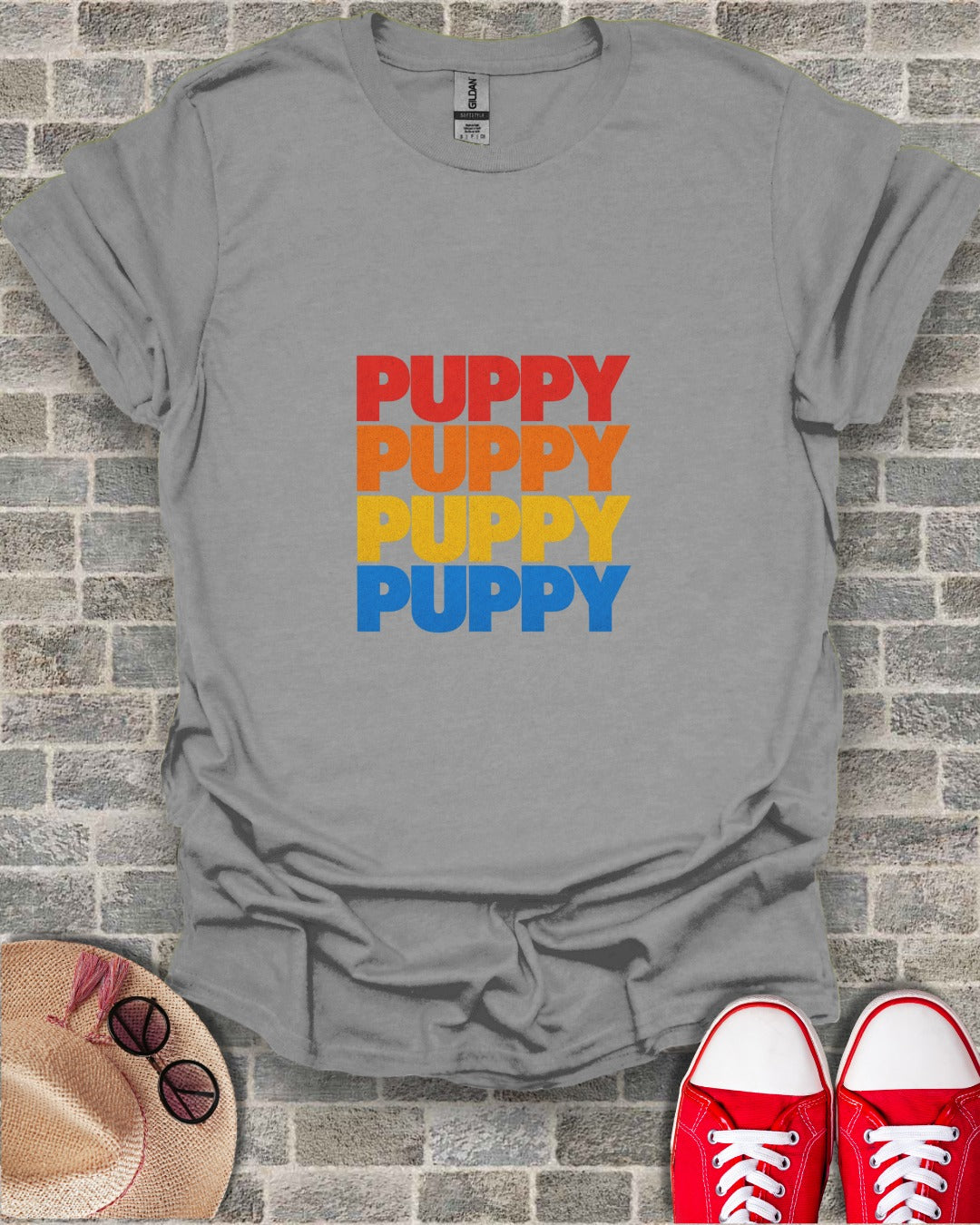 Gray t-shirt with "PUPPY" repeated in red, orange, yellow, and blue.