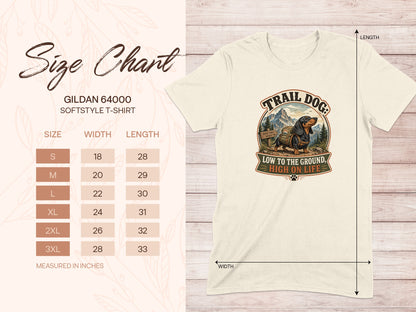 Gildan 64000 size chart with trail dog graphic, listing shirt measurements.